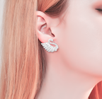 Elegant sterling silver swan earrings with intricate detailing, perfect for any occasion