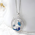 Origsoul sterling silver turtle necklace featuring a turtle and wave design with blue enamel and sparkling accents