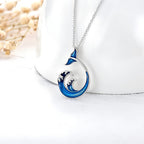 Origsoul sterling silver whale tail necklace with ocean wave design and blue enamel accents