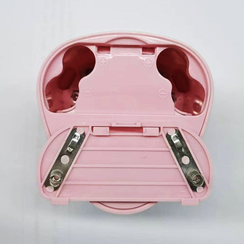 Origsoul pink battery operated pencil sharpener with open battery compartment and metal contacts