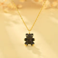 Unique gold bear pendant for special occasions on a delicate chain, featuring intricate detailing and charm