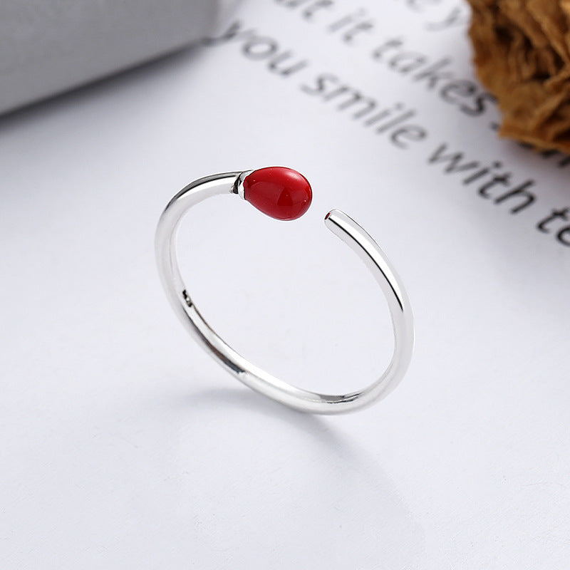 Origsoul unique minimalist silver ring with a small red teardrop detail on open band