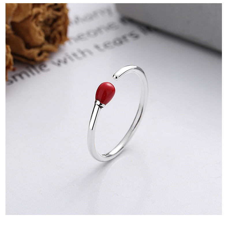 Origsoul unique minimalist silver ring with a red bead accent on a clean white background