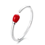 Origsoul unique minimalist silver ring with an open design featuring a red teardrop-shaped accent