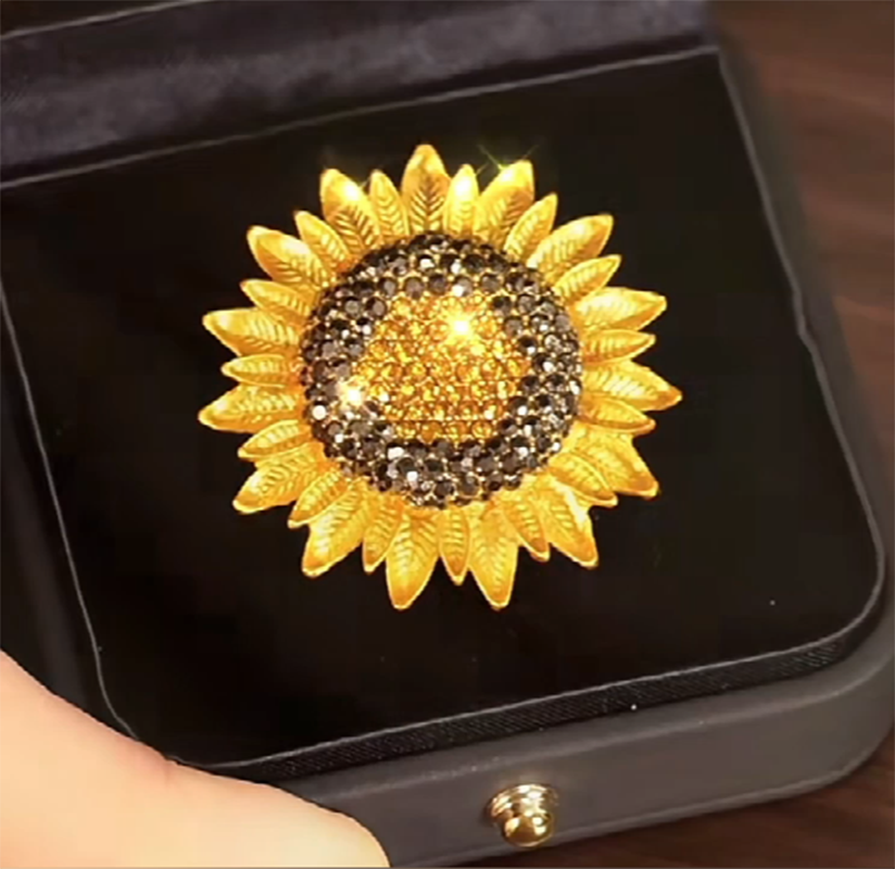 Origsoul Van Gogh sunflower brooch with golden petals and sparkling black and yellow crystals