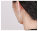 Origsoul silver cute rabbit charm earrings with chain detail worn on ear