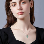 Origsoul green hummingbird pendant necklace worn by woman with black top