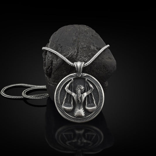 Handmade libra necklace by Origsoul featuring a silver pendant with Libra constellation scales design