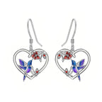 Origsoul hummingbird heart earrings featuring blue and purple hummingbirds with red flowers in heart-shaped silver frames