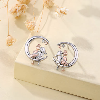 Origsoul moon and star fashion earrings featuring two girls sitting on crescent moons with stars