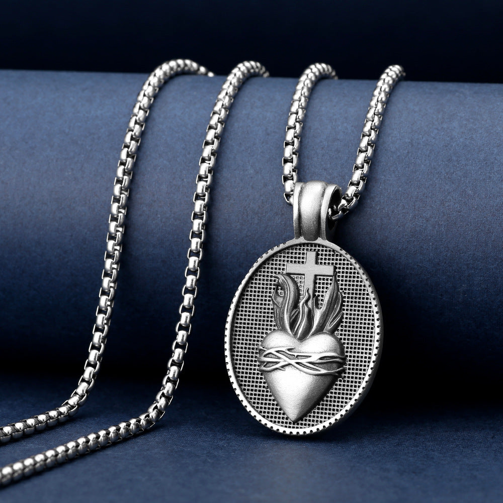 Origsoul Tranquil Spirit Collection silver sacred heart necklace pendant with chain on blue background