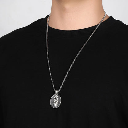 Origsoul Tranquil Spirit Collection silver sacred heart necklace pendant on chain worn with black shirt