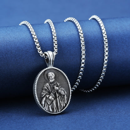Silver saint medallion necklace from Origsoul Tranquil Spirit Collection with detailed religious pendant