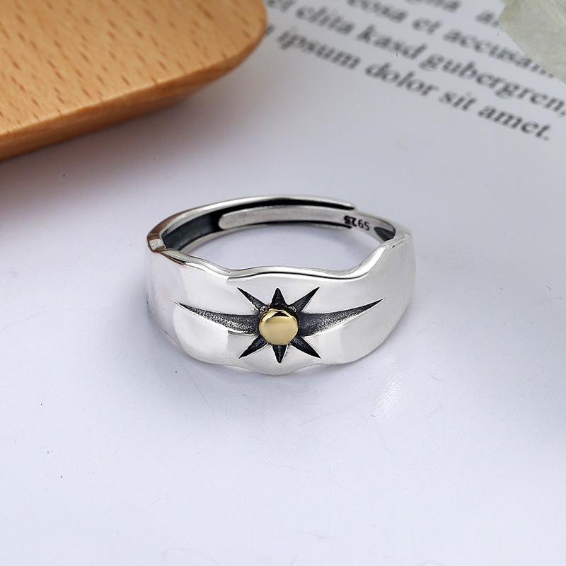 Origsoul sun ray ring silver with detailed star design and gold center on smooth band