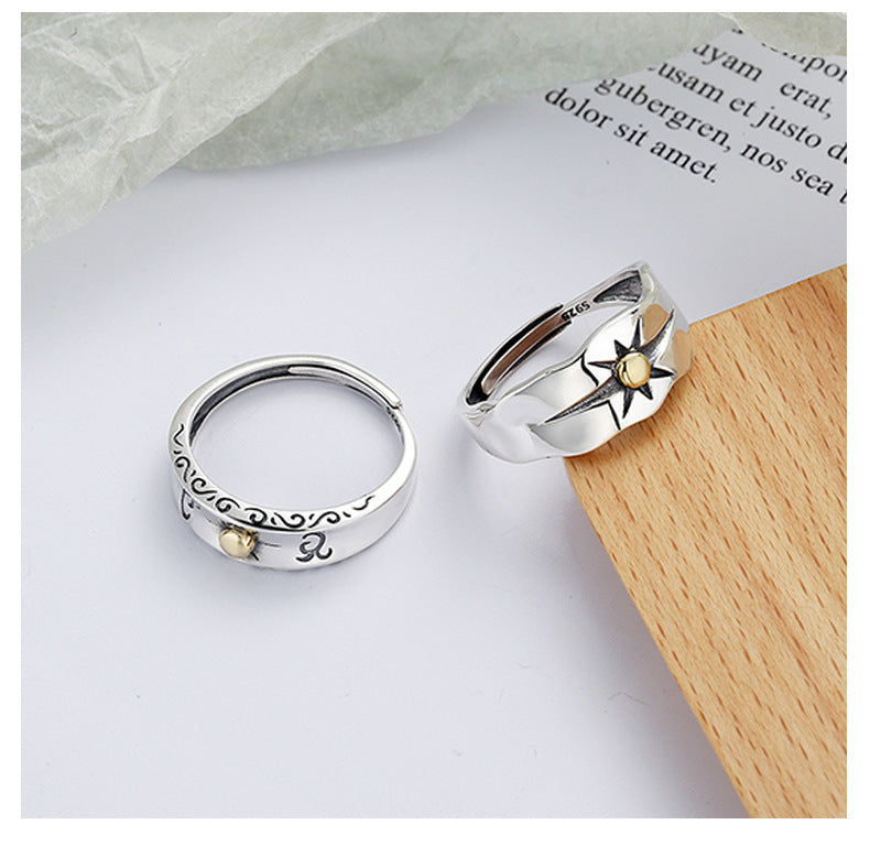 Origsoul sun ray ring silver with gold center and intricate cosmic design on silver bands