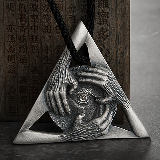 Origsoul symbolic triangle necklace from Tranquil Spirit Collection featuring an eye with detailed hands design