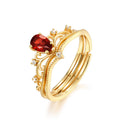 Origsoul vintage engagement ring with gold band and pear-shaped red gemstone centerpiece
