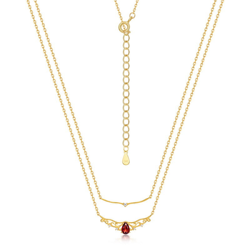 Origsoul gold layered necklace with red gemstone inspired by vintage engagement ring design